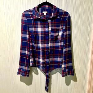 Plaid light weight long sleeve shirt with front tie. See through material.